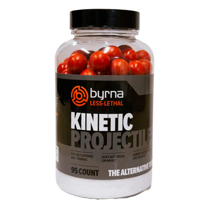 A container labeled 'BYRNA LESS LETHAL KINETIC PROJECTILES' with .61 caliber red-colored plastic projectiles visible inside.